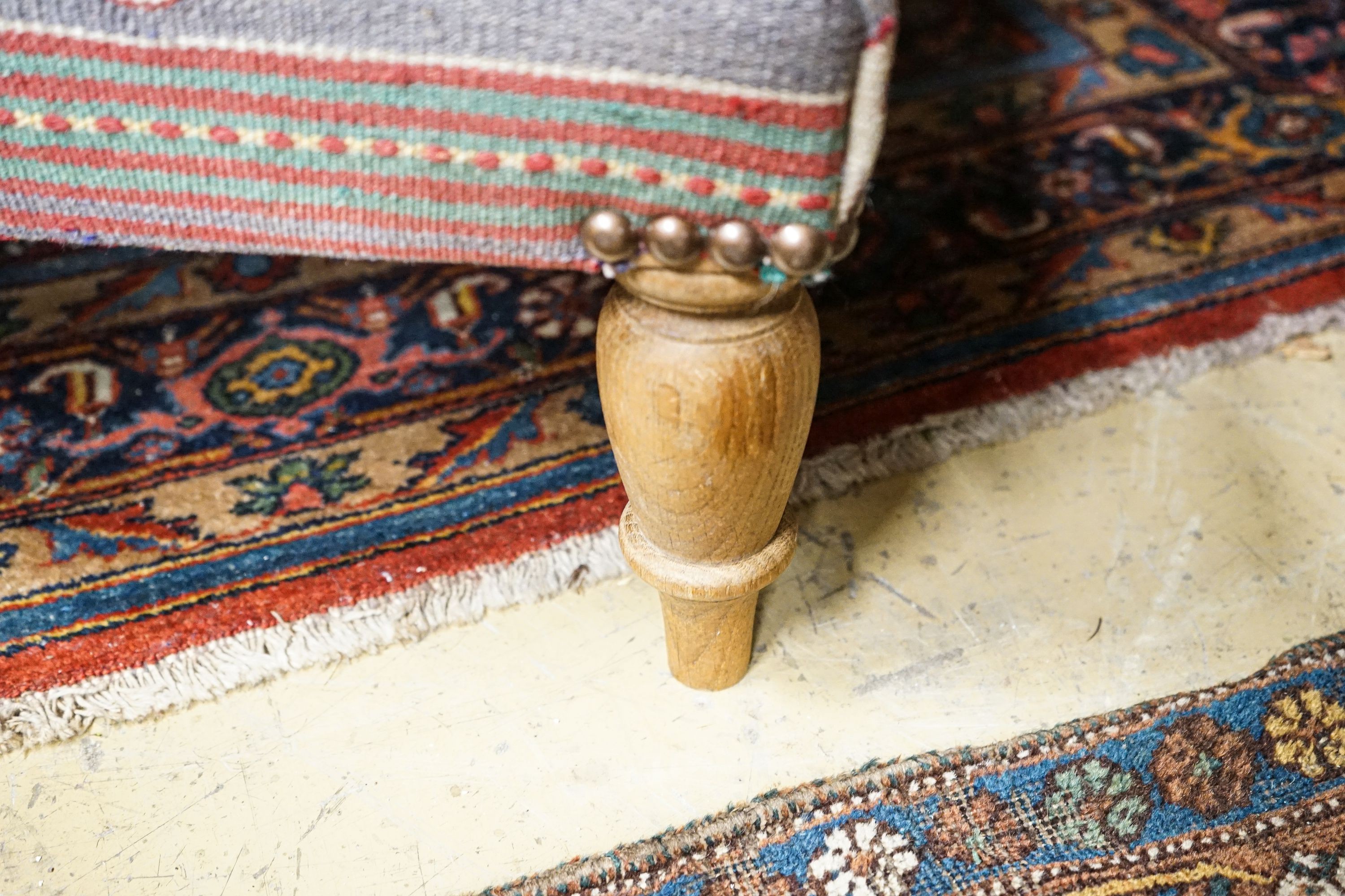 A large rectangular Kelim footstool on turned oak feet, length 124cm, depth 80cm, height 28cm